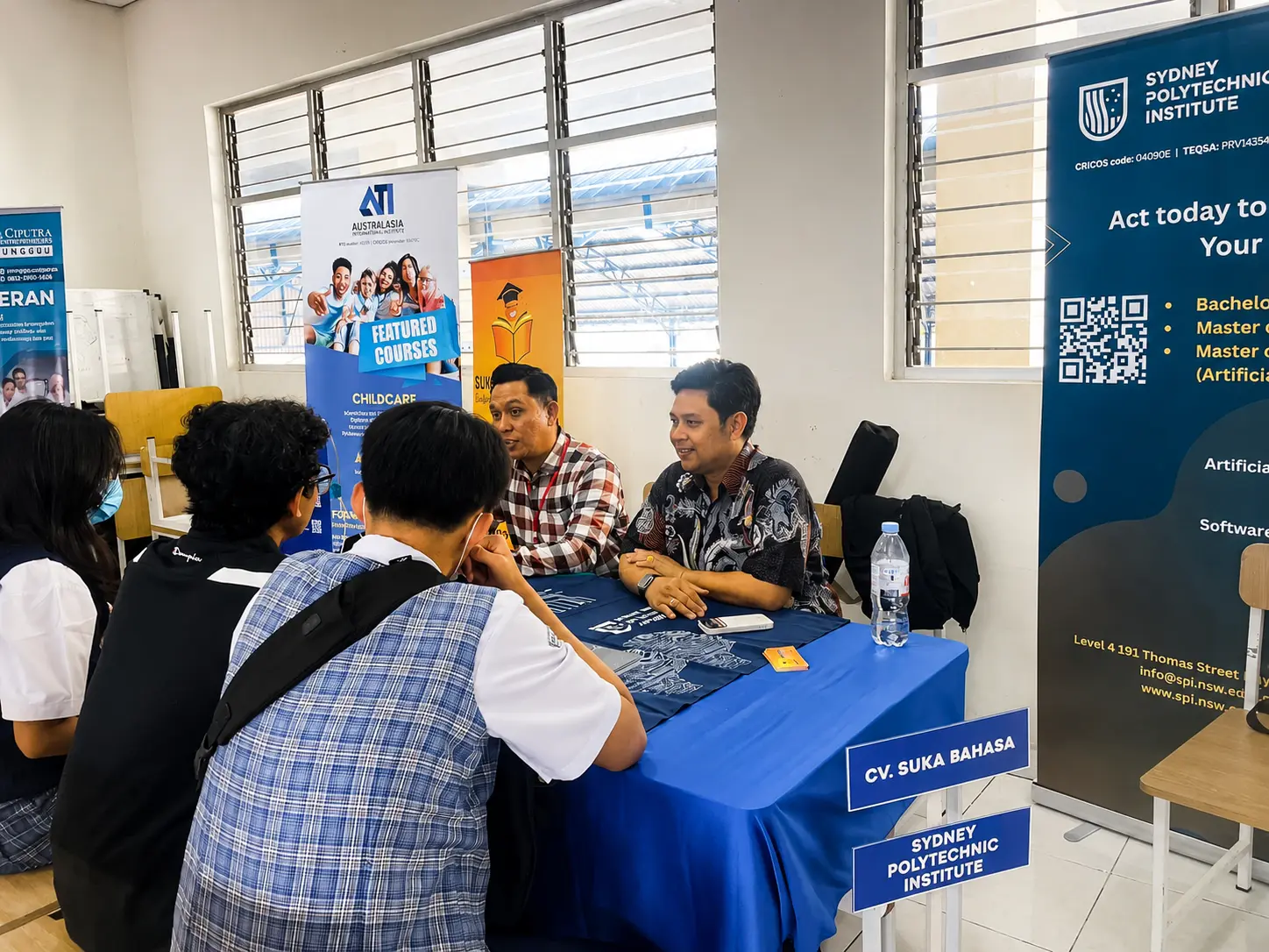 Consultant explaining study options to a student